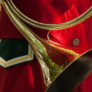 Golden horn and red uniform