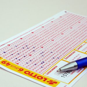 Person playing a lottery ticket
