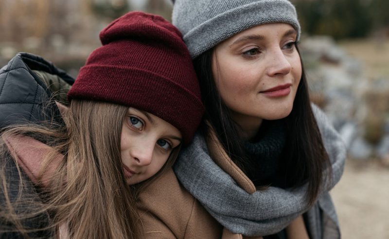 Stepmother and stepdaughter posing