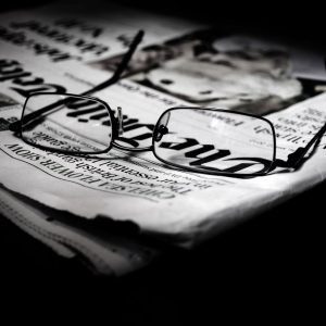 Glasses on a newspapers