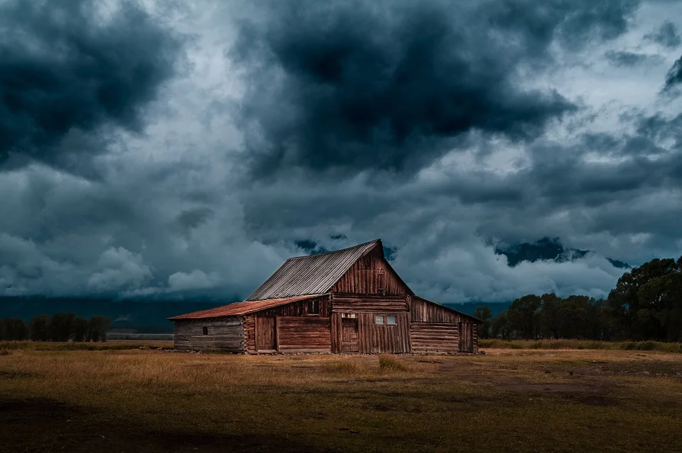 Stormy clouds above cottage