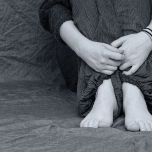 Anxious person sitting