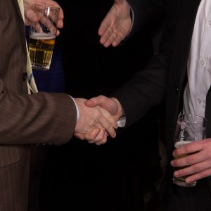 Two people with an acquaintance