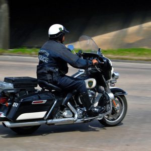 Policeman on a motorcycle in pursuit
