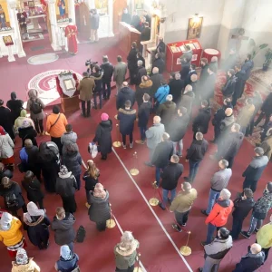 Liturgy or mass in a church with people inside