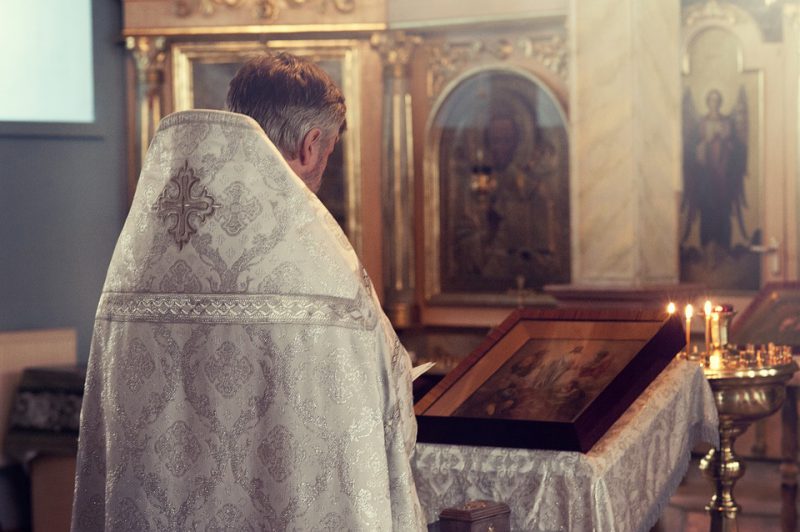 The priest performs the liturgy