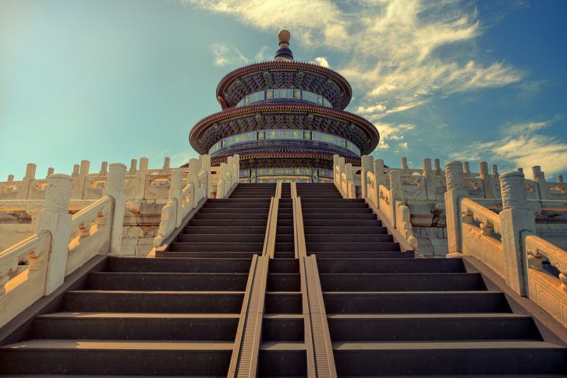 Double stairs with a building at the top