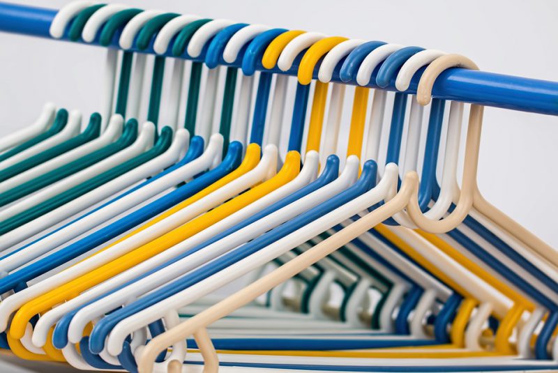 Hangers lined up on a rod