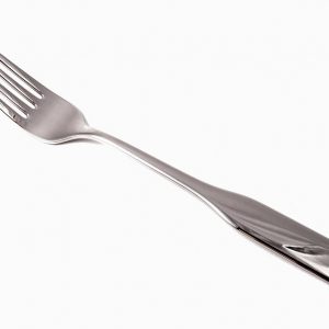 Fork on a white surface