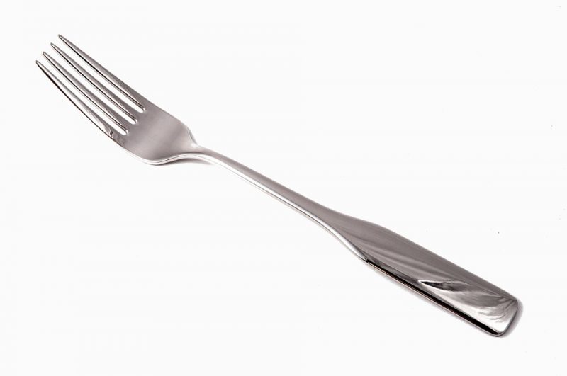Fork on a white surface