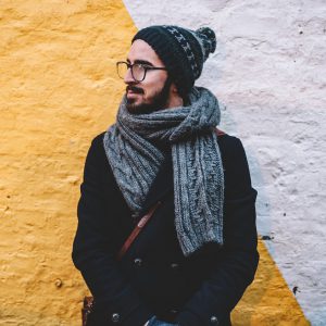 A woolen scarf wrapped around a man's neck