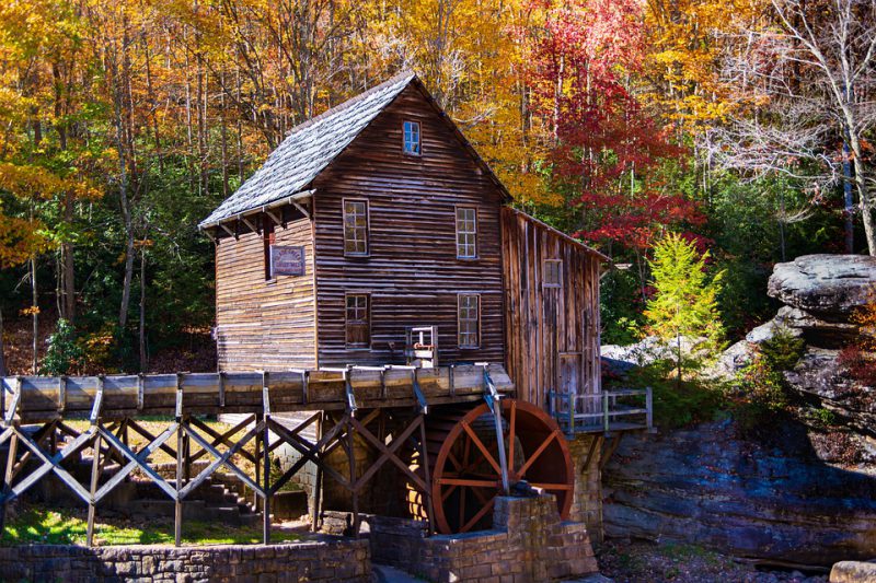 An old wooden mill with a water wheel