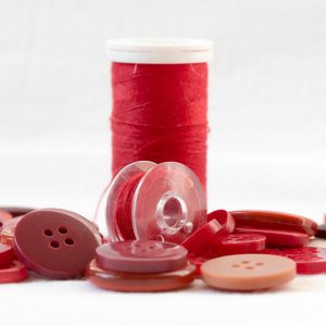 Red threads and red buttons