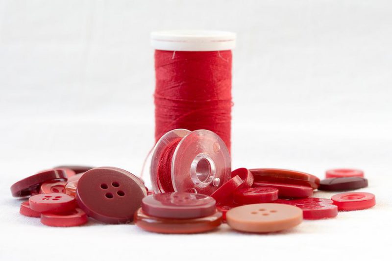 Red threads and red buttons