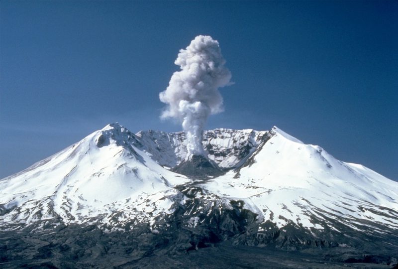 Volcano peak with steam on top