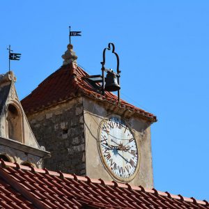 Old tower with clock and bell