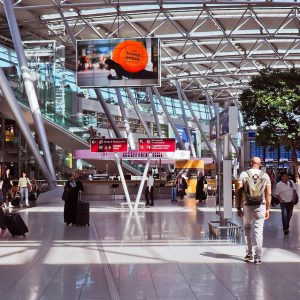 Travelers on station hall