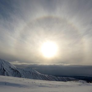Sky above snowed mountins