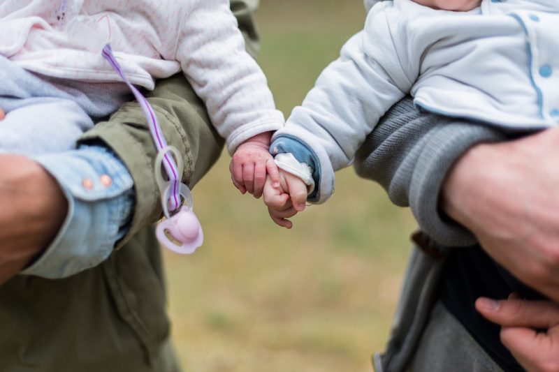 Cousins holding hands illustration