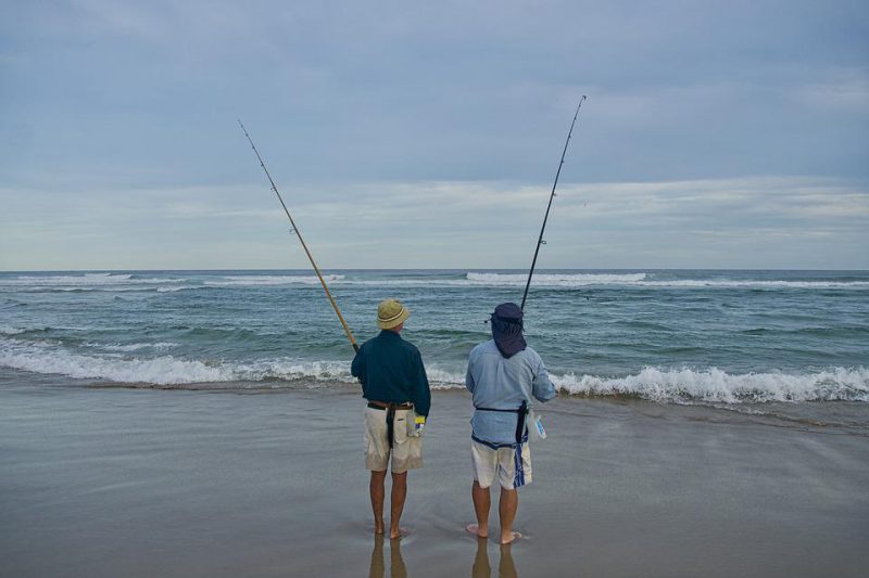 Fishermans on the ocean coast